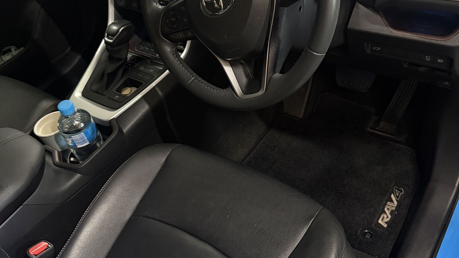 The same footwell after detailing, the mat and carpet clean